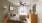 a bedroom with a bed and a fan