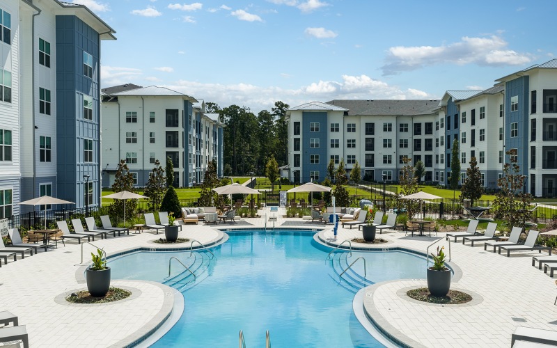 a pool in front of a building