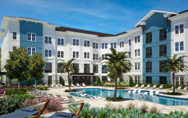 a pool in front of a building